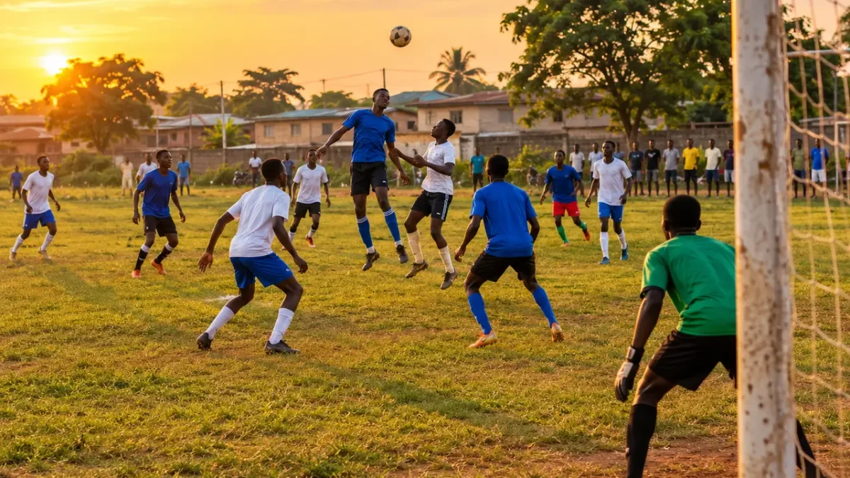 Young players competing in a community football match on a local pitch in AMAC/Bwari, Abuja